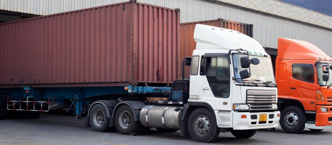 truck-container-ship-parked-warehouse-distribution
